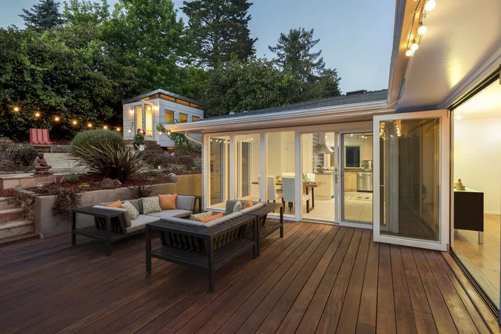 Deck contractor discussing a free estimate and custom deck project with Houston homeowners